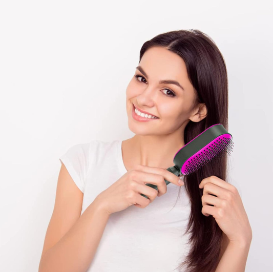 Cepillo masajeador con cojín de aire